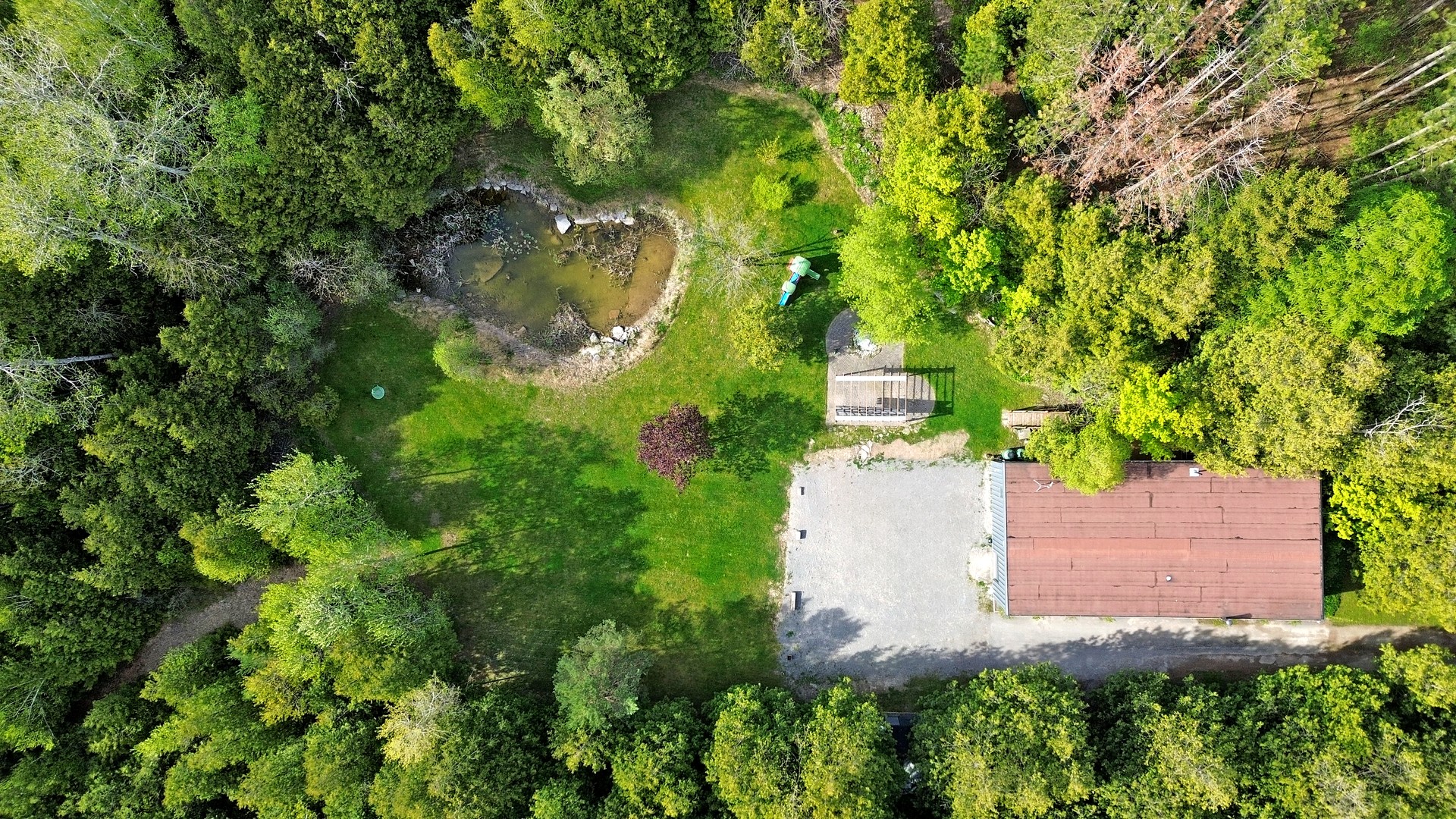 Aerial of 13.58 forested acres with river frontage at 44 Edgewood Road